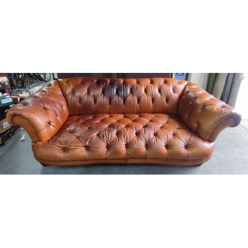 689 - Brown Chesterfield sofa