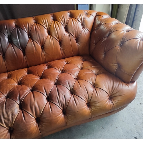 689 - Brown Chesterfield sofa