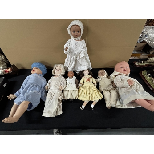 251 - 7 Dolls all in clothes