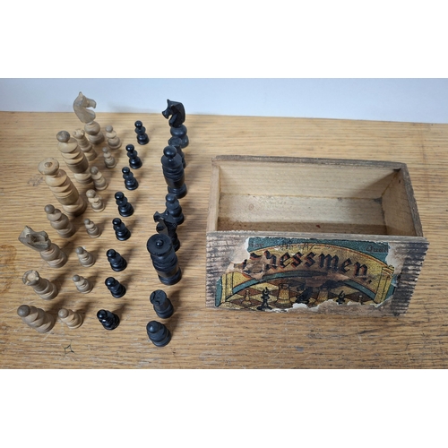 261 - Early/mid 20thC boxed wooden chess pieces, the box retains the original paper label which states sim... 