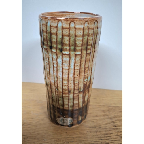 531 - Llangollen pottery tubular vase, marked to base and with paper label