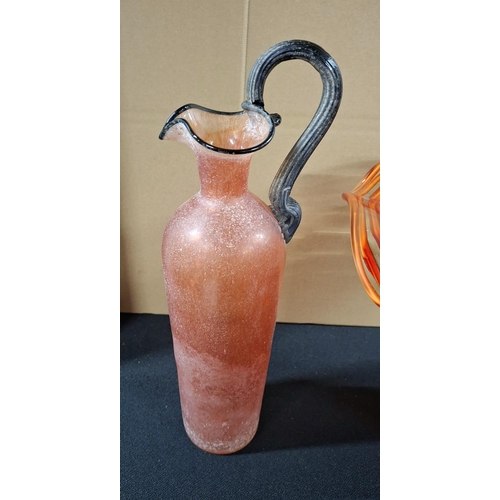 380 - Large orange glass table centre-piece together with an Italian Gambaro & Poggi of Murano glass jug (... 