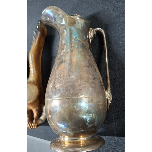 381 - Mid 20thC white metal Thermos with cork stopper together with a Bossons Eagle wall plaque (2)