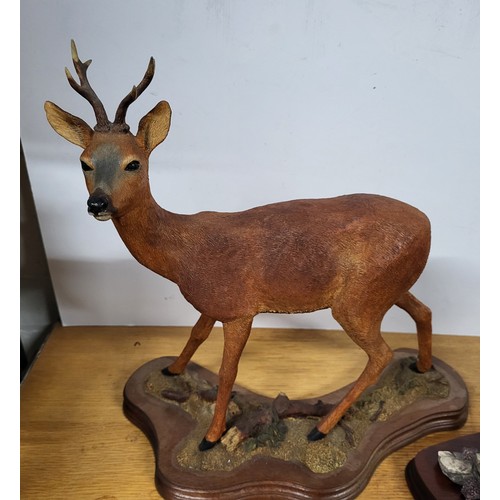394 - Ceramic deer and a border fine arts stag figure 