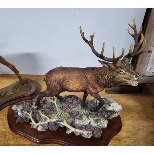 394 - Ceramic deer and a border fine arts stag figure 