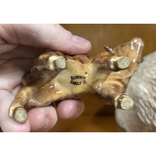 412 - Small, unusual brown Beswick calf