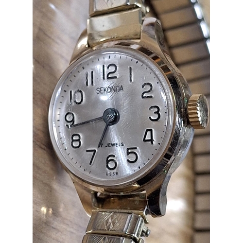 135 - Two watches, a ladies vintage Seconda dress watch and another, branded watch without a strap (2)