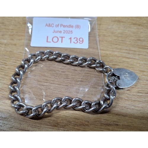 139 - Heavy chain bracelet with hallmarked silver heart lock, 26.5 grams