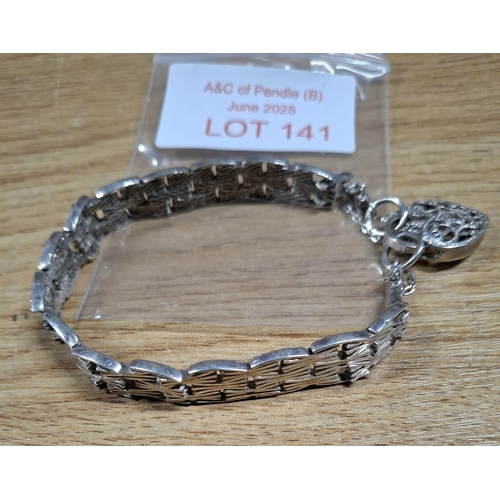 141 - Stunning quality bracelet with pierced heart clasp stamped SIL, 25 grams