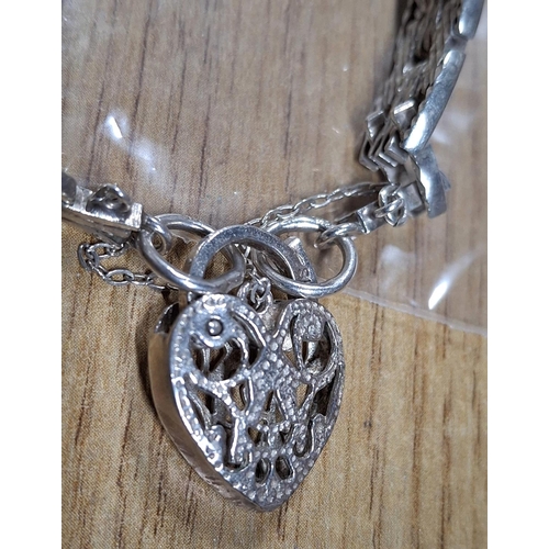 141 - Stunning quality bracelet with pierced heart clasp stamped SIL, 25 grams