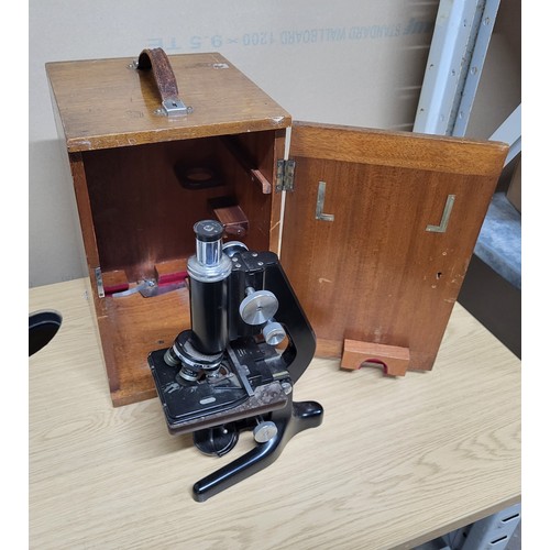 Mid 20thc boxed microscope by 
