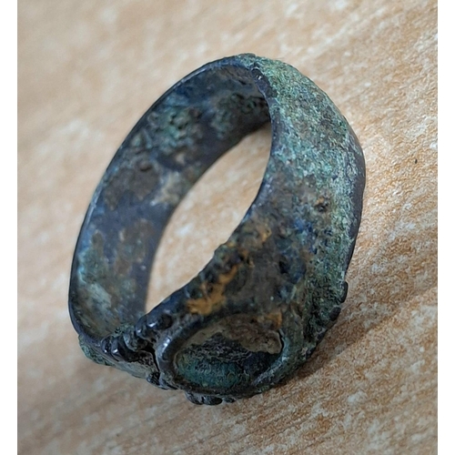 354 - Late Roman era copper ring with setting for a oval shaped stone