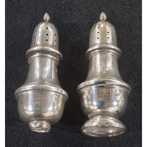 10 - Pair of hallmarked silver pepperettes, 57.5 grams