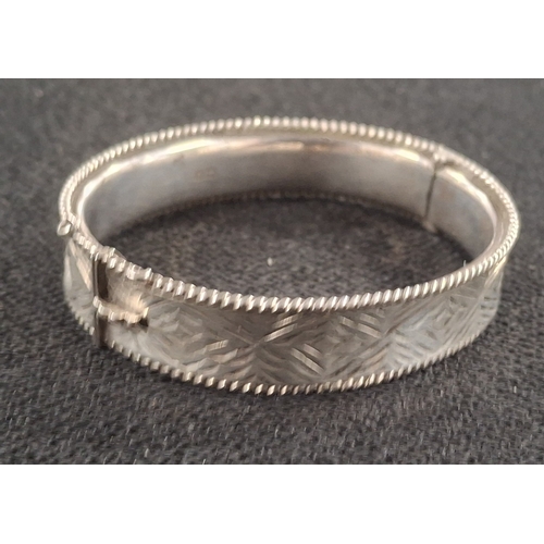 12 - Hallmarked Birmingham silver engraved bangle, 21.5 grams