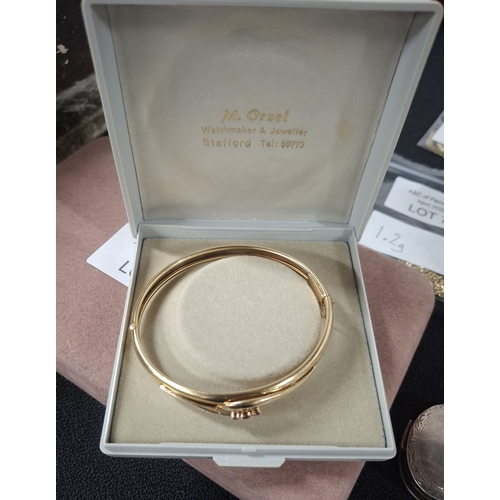 3 - Boxed 9ct yellow gold solid bracelet with diamond and Ruby chips, 10.3 grams gross