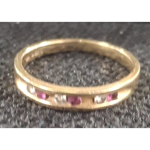 30 - Hallmarked 18ct gold ladies ring with round cut small diamonds and Rubies in a presentation box, 2.5... 