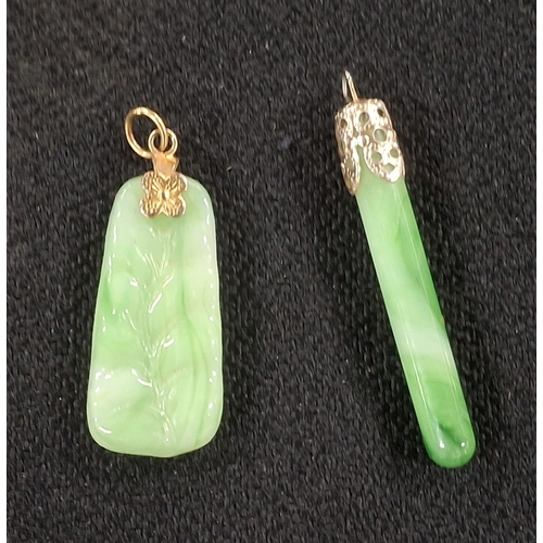 35 - Two Jade carved pendants (2)