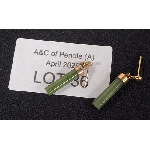 36 - Pair of dark Jade earrings set in unmarked gold coloured metal settings
