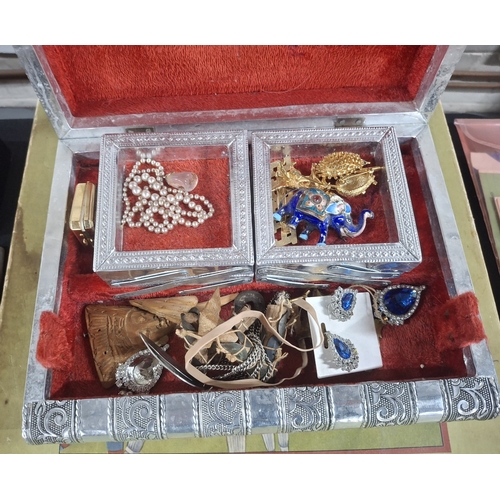 48 - Jewellery box in the form of a white metal book with costume jewellery contents