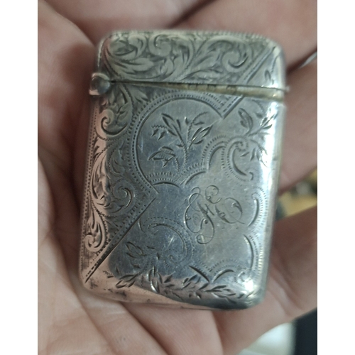 51 - Birmingham hallmarked silver vesta, extensively engraved to both sides, 

29 grams