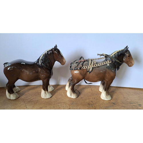 52 - Two large Beswick, brown Shire horses with coloured manes one in a harness (2)