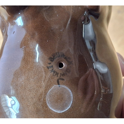 52 - Two large Beswick, brown Shire horses with coloured manes one in a harness (2)