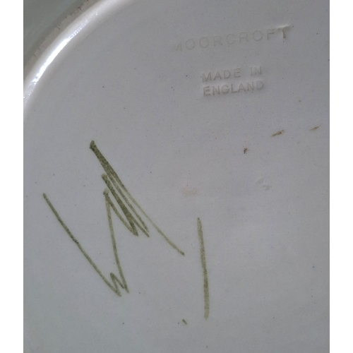 25 - Moorcroft Hibiscus pattern plate, signed in initial to under-side, with associate Moorcroft table li... 