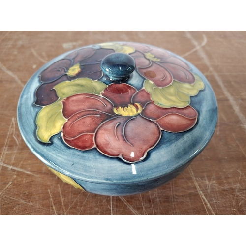31 - Old Moorcroft Hibiscus pattern medium sized lidded bowl.