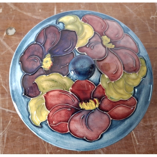31 - Old Moorcroft Hibiscus pattern medium sized lidded bowl.