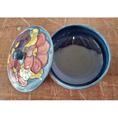 31 - Old Moorcroft Hibiscus pattern medium sized lidded bowl.