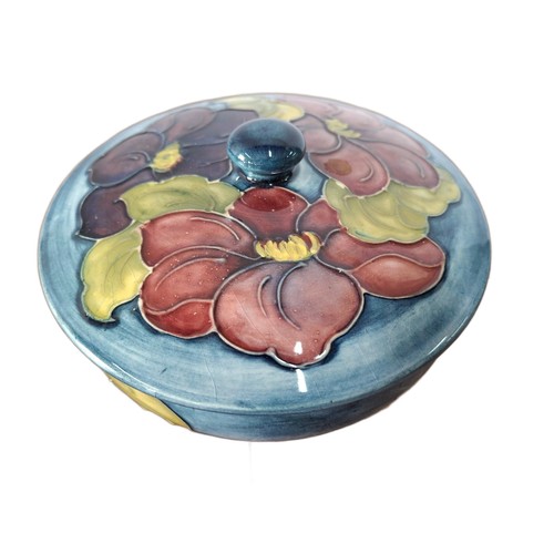 31 - Old Moorcroft Hibiscus pattern medium sized lidded bowl.