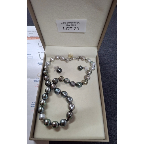 29 - Boxed set of 9-12mm Tahitian graduating Pearl necklace with matching earrings with large, hallmarked... 