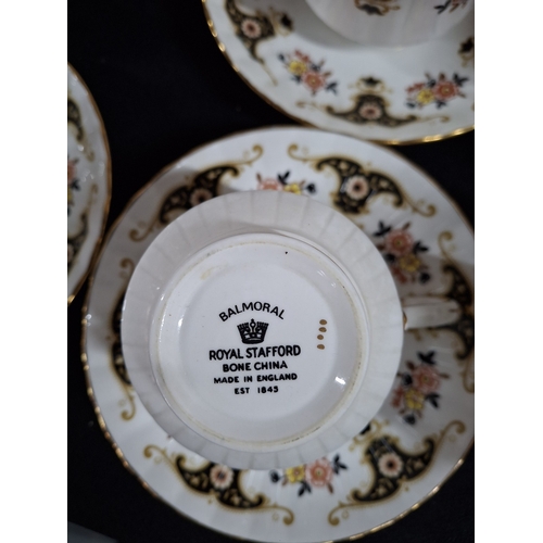 105 - Royal Stafford bone China part tea service and a water jug and bowl