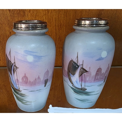 411 - Pair of oriental hand-painted small vases depicting nautical scenes with hallmarked silver tops, 12c... 