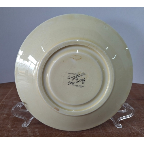 447 - Clarice Cliff for Newport Pottery, Bizarre over-sized saucer, with impressed date marks for October ... 