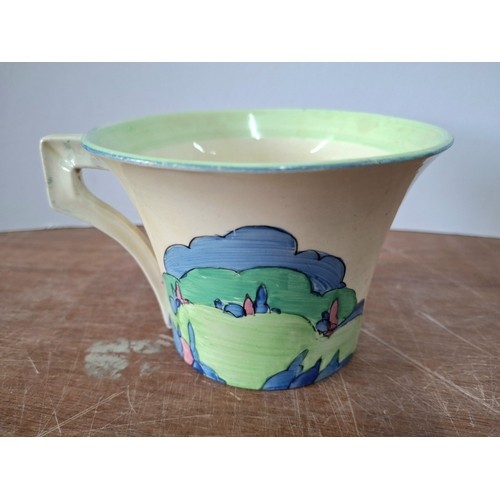 447 - Clarice Cliff for Newport Pottery, Bizarre over-sized saucer, with impressed date marks for October ... 