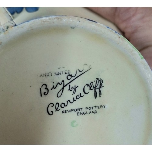 447 - Clarice Cliff for Newport Pottery, Bizarre over-sized saucer, with impressed date marks for October ... 