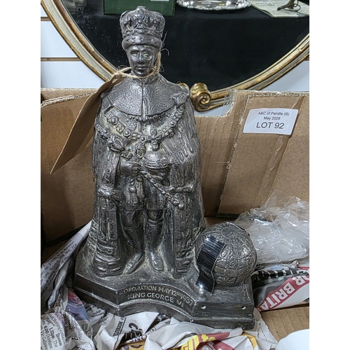 92 - A spelter table lighter in the form of King George VI in garter robes, C.1930's, together with comme... 