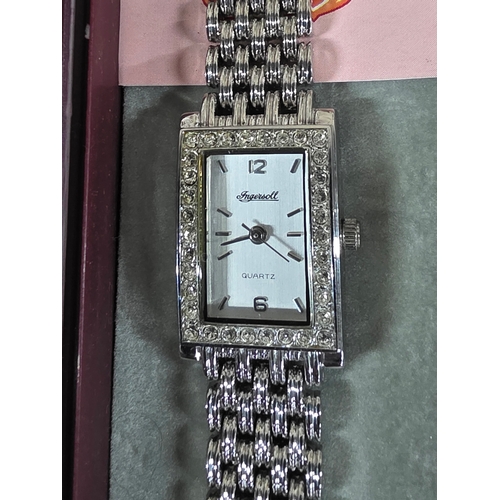 11 - Ladies' Ingersoll wristwatch in original case with spare link etc.