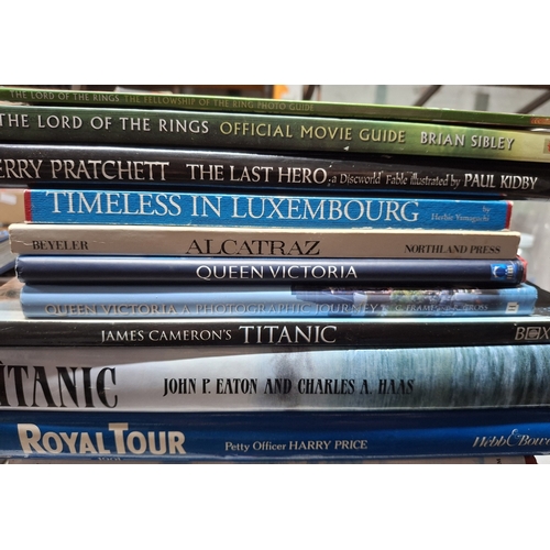 231 - Large quantity of various large coffee table books including John Lennon, Terry Pratchett, L Ron Hub... 