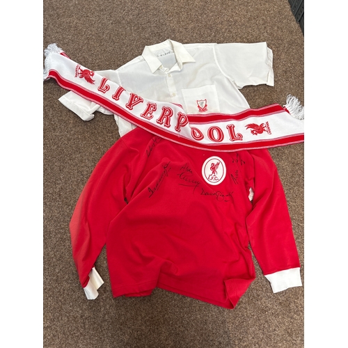 Two Liverpool football club shirts ( one signed) and a Liverpool fc Scarf