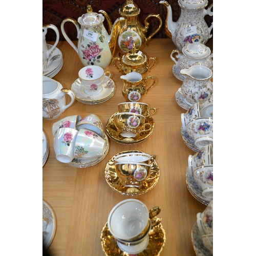 222 - Gilt Cups, Saucers, Teapots etc.