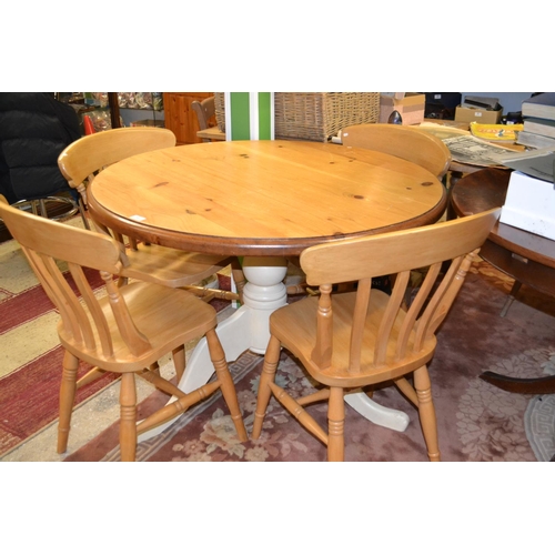 570 - Round pine pedestal table with painted base & four chairs