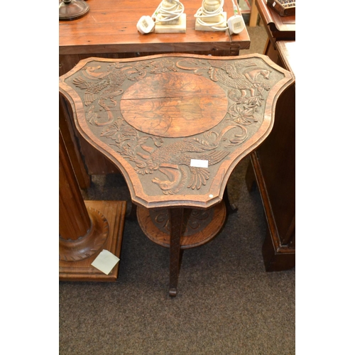 282 - 2 Tier Oak Carved Table , 3 Legs featuring winged horse relief