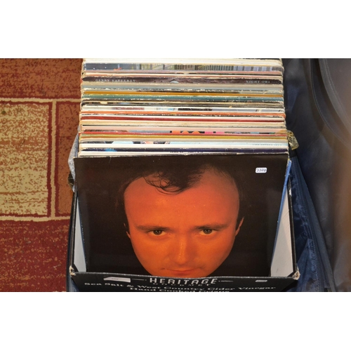 569 - Box of vinyl inc. Phil Collins