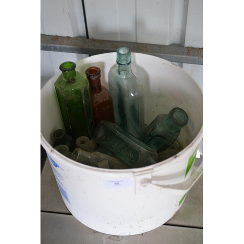 52 - Bucket of old glass bottles