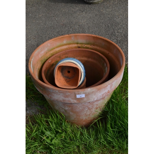 86 - 2 Large terracotta pots & others