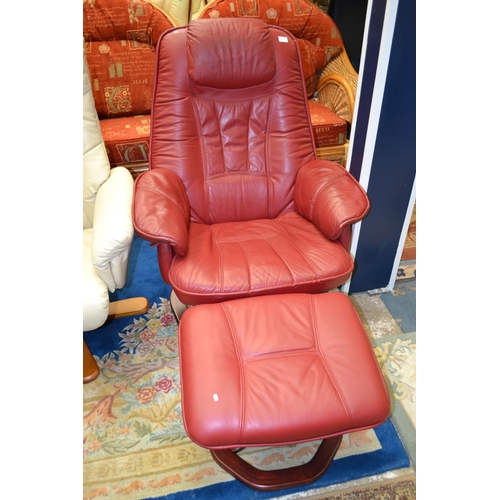 577 - Red Stressless Swivel Armchair with Footrest