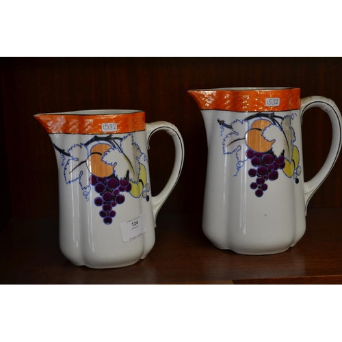 124 - Pair of Graduated Jugs with Glaze Top