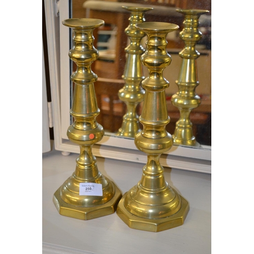 250 - Pair of brass candle sticks. H30cm.